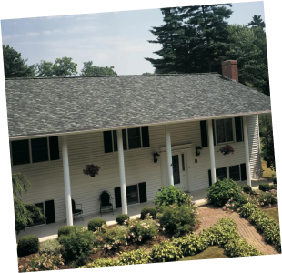 Two-story house with new asphalt shingle roofing