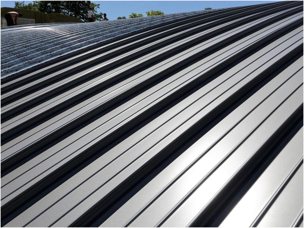 Close-up of clean, silver standing seam metal roofing